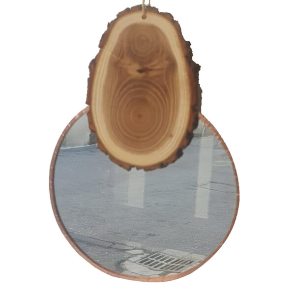 Miroir suspendu artisanal avec bois brut aux contours naturels et miroir rond cerclé cuivré